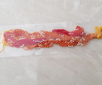 Red Pearl Bead Thread Rakhi 1 Pc